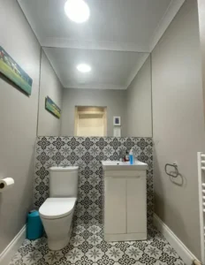 Bathroom mirror installation in a Wicklow home