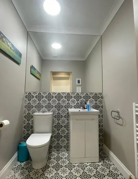 Bathroom mirror installation in a Wicklow home