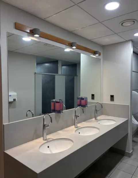 Custom commercial bathroom mirror installed in a business premises in Wicklow