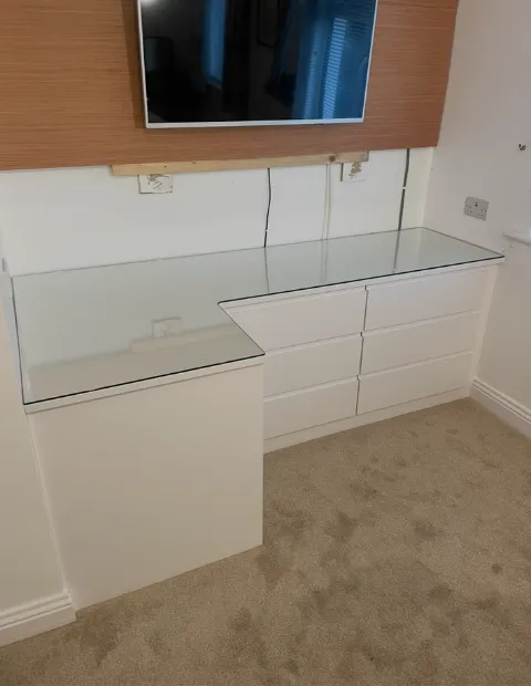 Custom glass tabletop fitted by P Fahy Glazing Ltd in South Dublin — polished, clear glass cut to size for a modern dining table.
