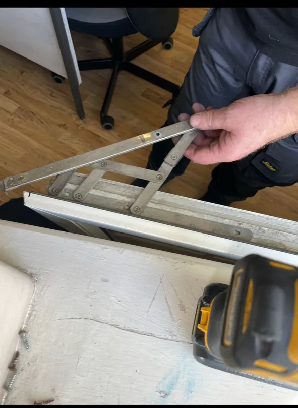 Hinge replacement carried out to fix a draughty window in a Wicklow home.