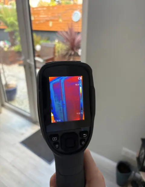 Infrared heat-loss scan showing the benefits of a double glazing upgrade in a Wicklow property.